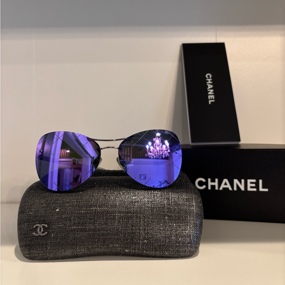 CHANEL
Silvertone Metal And Purple Tinted Sunglasses-4218